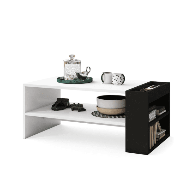 Moderne hvidt og sort sofabord med åbne hylder i en lys stue.